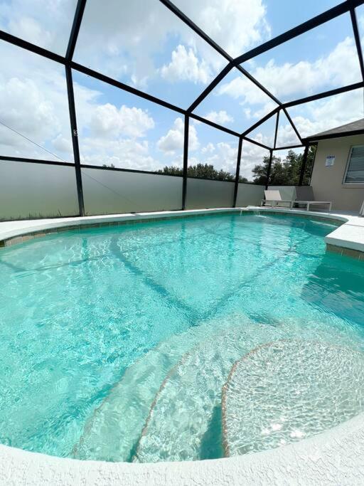 Luxury Modern Pool House Close To Theme Parks Four Bedrooms